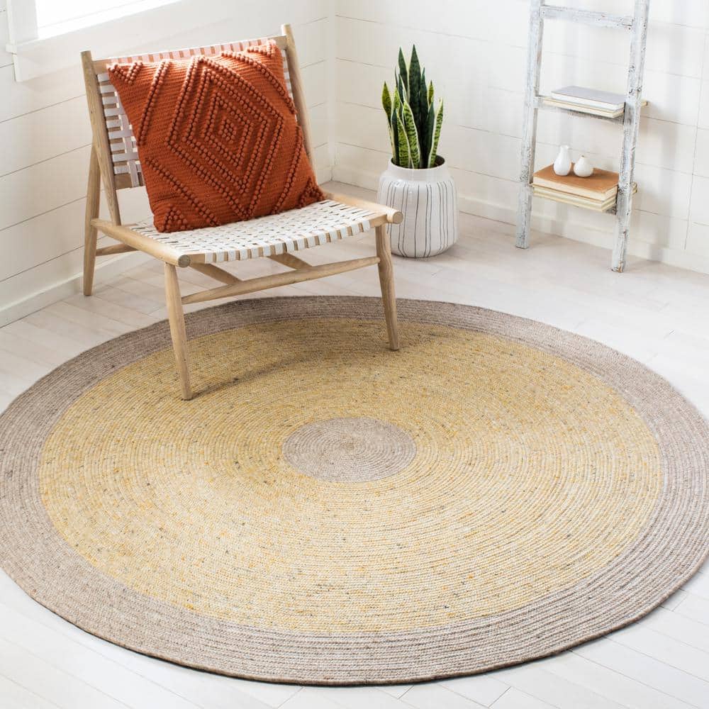 Handmade Gold and Beige Round Wool Braided Rug