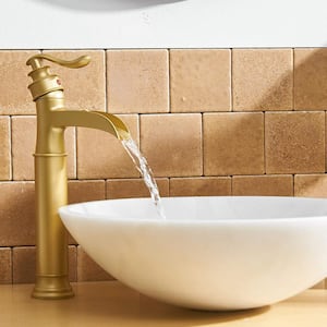 Waterfall Single Hole Single-Handle Vessel Bathroom Faucet With Pop-up Drain Assembly in Brushed Gold
