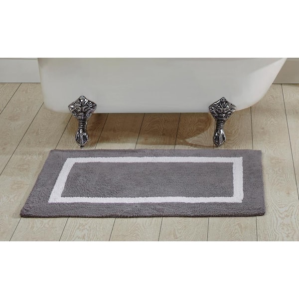https://images.thdstatic.com/productImages/8fedb805-5224-4b36-a0bd-73ef66836262/svn/gray-white-better-trends-bathroom-rugs-bath-mats-ss-baho2440grwh-64_600.jpg