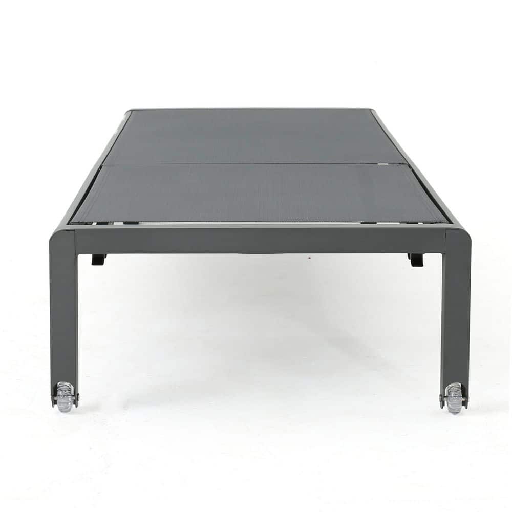 Gray metal outdoor chaise lounge viewed from the top angle.