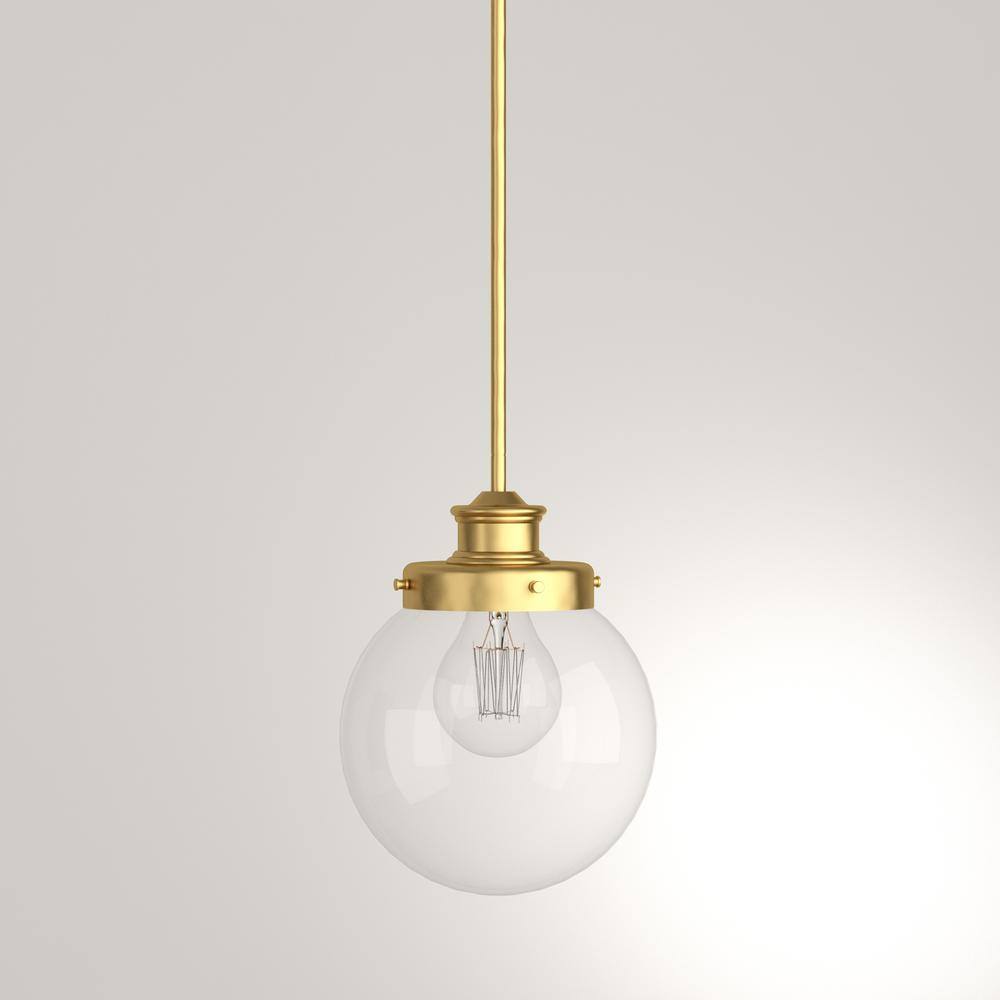 Elegant Mini Globe Pendant in Natural Brass with Clear Glass