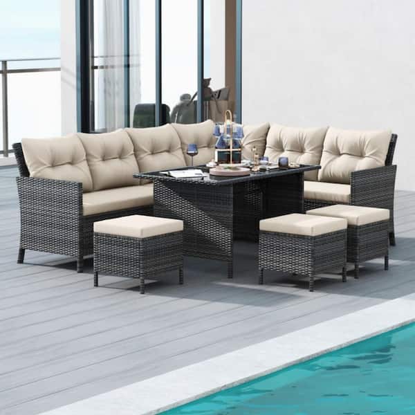 7-Piece Wicker Outdoor Dining Set with White Cushions and Ottomans