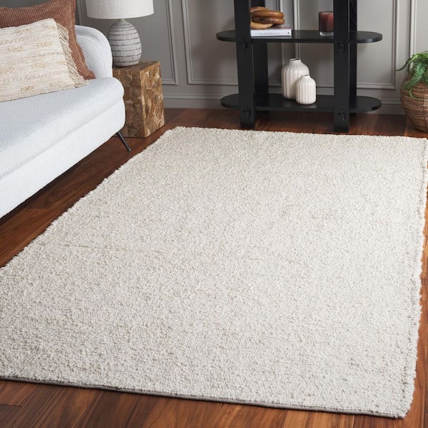 Renewal 8 ft. x 10 ft. Ivory Distressed Solid Area Rug