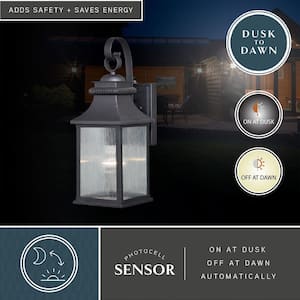 Cambridge 1 Light Dusk to Dawn Bronze Outdoor Wall Lantern Clear Glass