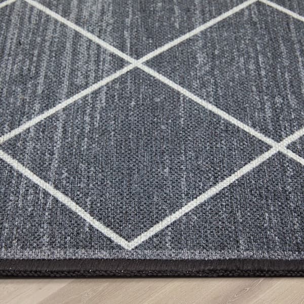 https://images.thdstatic.com/productImages/9081d423-3eb8-4492-b232-f5111c6bcc26/svn/grey-well-woven-area-rugs-kc-128-2s-fa_600.jpg