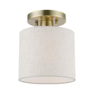 Blossom 7 in. 1-Light Antique Brass Petite Semi-Flush Mount with Oatmeal Color Fabric Shade