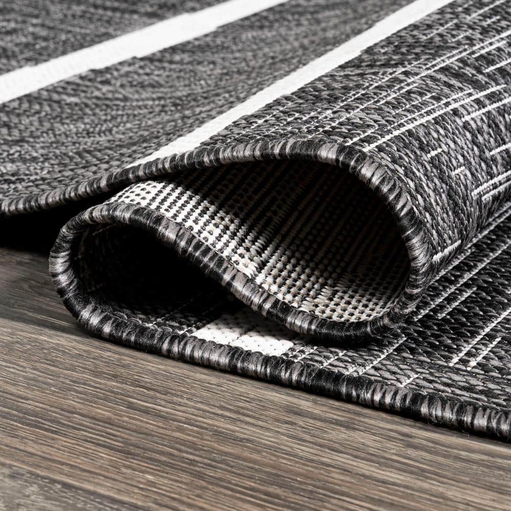 3' x 5' Black and Ivory Synthetic Stripe Rectangular Rug