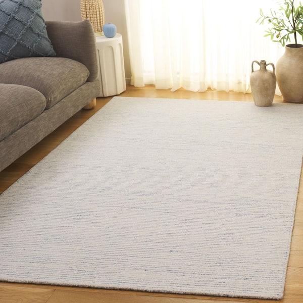 Abstract 8 ft. x 10 ft. Ivory Solid Color Area Rug