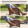 Person sitting in the rocking chair demonstrating adjustments.