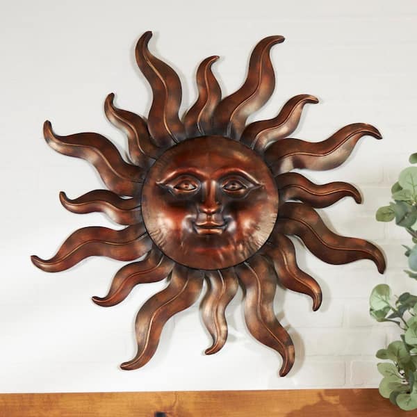 Litton Lane Metal Bronze Sun Wall Decor with Smiling Face and