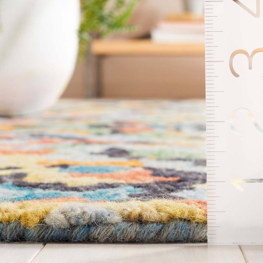 Blue Multicolor Tufted Wool and Cotton 8' x 10' Area Rug
