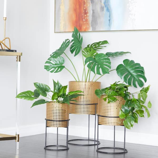 Litton Lane 23 in., 19 in., and 16 in. Large Gold Metal Rattan Weave Inspired Planter with Removeable Ring Stands (3- Pack)