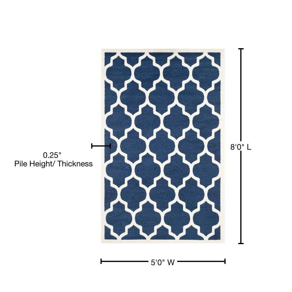 Reversible Geometric Navy and Beige 5' x 8' Synthetic Area Rug