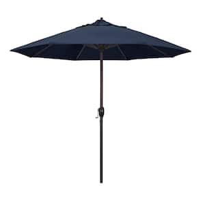 9 ft. Bronze Aluminum Pole Market Aluminum Ribs Auto Tilt Crank Lift Patio Umbrella in Spectrum Indigo Sunbrella