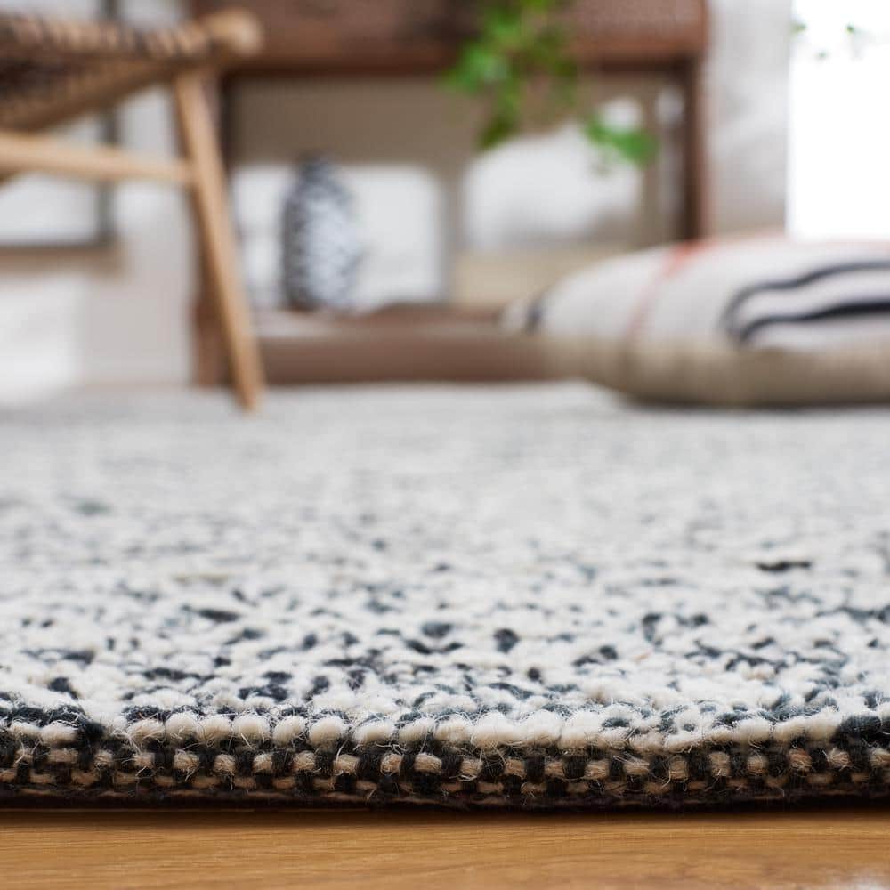 Handmade Black and Ivory Geometric Wool Area Rug, 6' Square