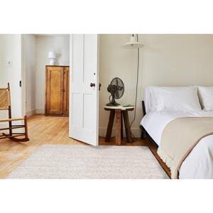 Ivory 5 ft. x 8 ft. Rectangle Solid Color Polyester Area Rug