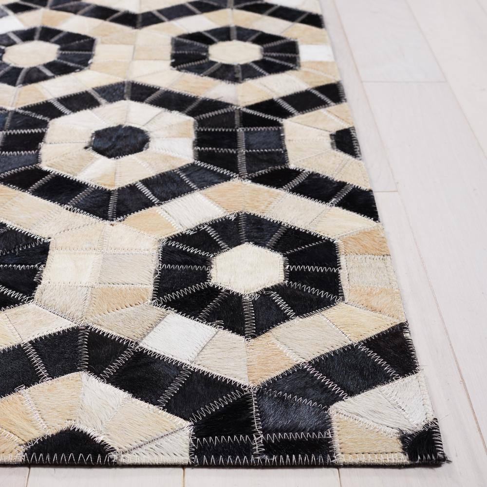 Handmade Black and Beige Geometric Cowhide Runner Rug