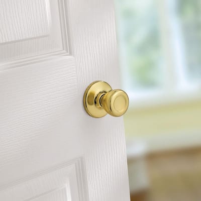 Tylo Polished Brass Passage Hall/Closet Door Knob Featuring Microban Antimicrobial Technology