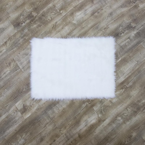 Home Decorators Collection Faux SheepSkin White Doormat 2 ft. x 3 ft. Abstract Area Rug