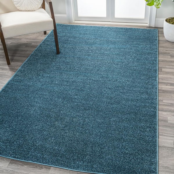 JONATHAN Y Haze Solid Low-Pile Turquoise 6 ft. x 9 ft. Area Rug