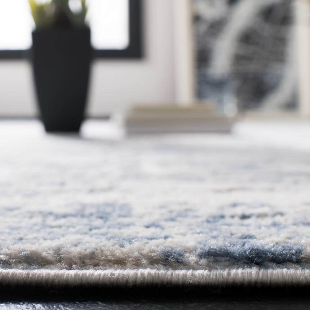 Ivory and Blue Abstract Hand-knotted Synthetic Runner Rug
