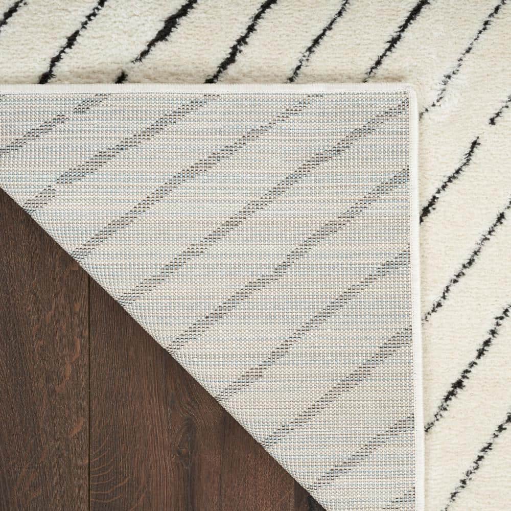 Ivory Black Abstract 8' x 10' Synthetic Area Rug