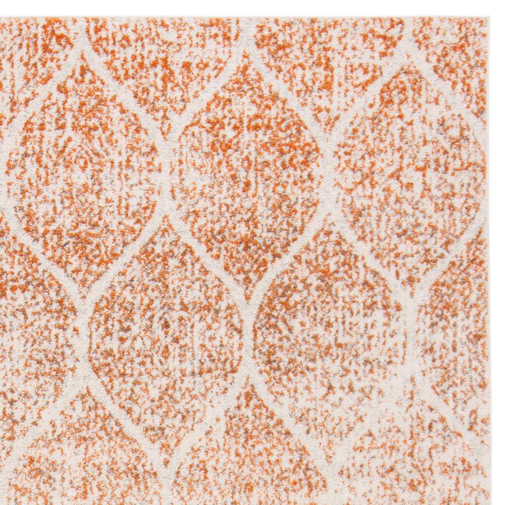 Cream/Orange Easy-Care Synthetic 9' x 12' Area Rug