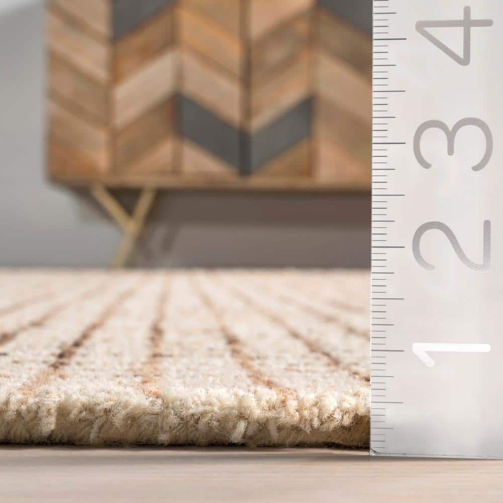 Cream and Beige Tufted Wool 6' x 9' Area Rug