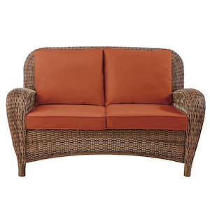 Beacon Park Brown Wicker Outdoor Patio Loveseat with CushionGuard Quarry Red Cushions