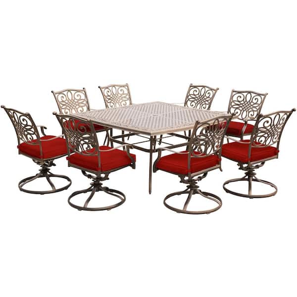 Cambridge Seasons 9-Piece Metal Outdoor Dining Set in Red with Cushions Swivel Rockers and a Cast-top Square Table