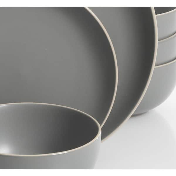 https://images.thdstatic.com/productImages/92141e50-6921-47ae-951c-363db202c6a1/svn/matte-gray-gibson-home-dinnerware-sets-131275-24-fa_600.jpg