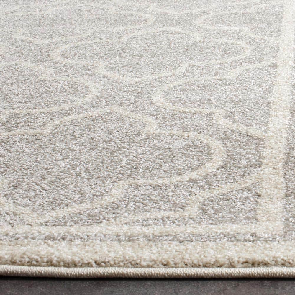 Ivory and Light Grey Geometric Synthetic 6' x 9' Area Rug