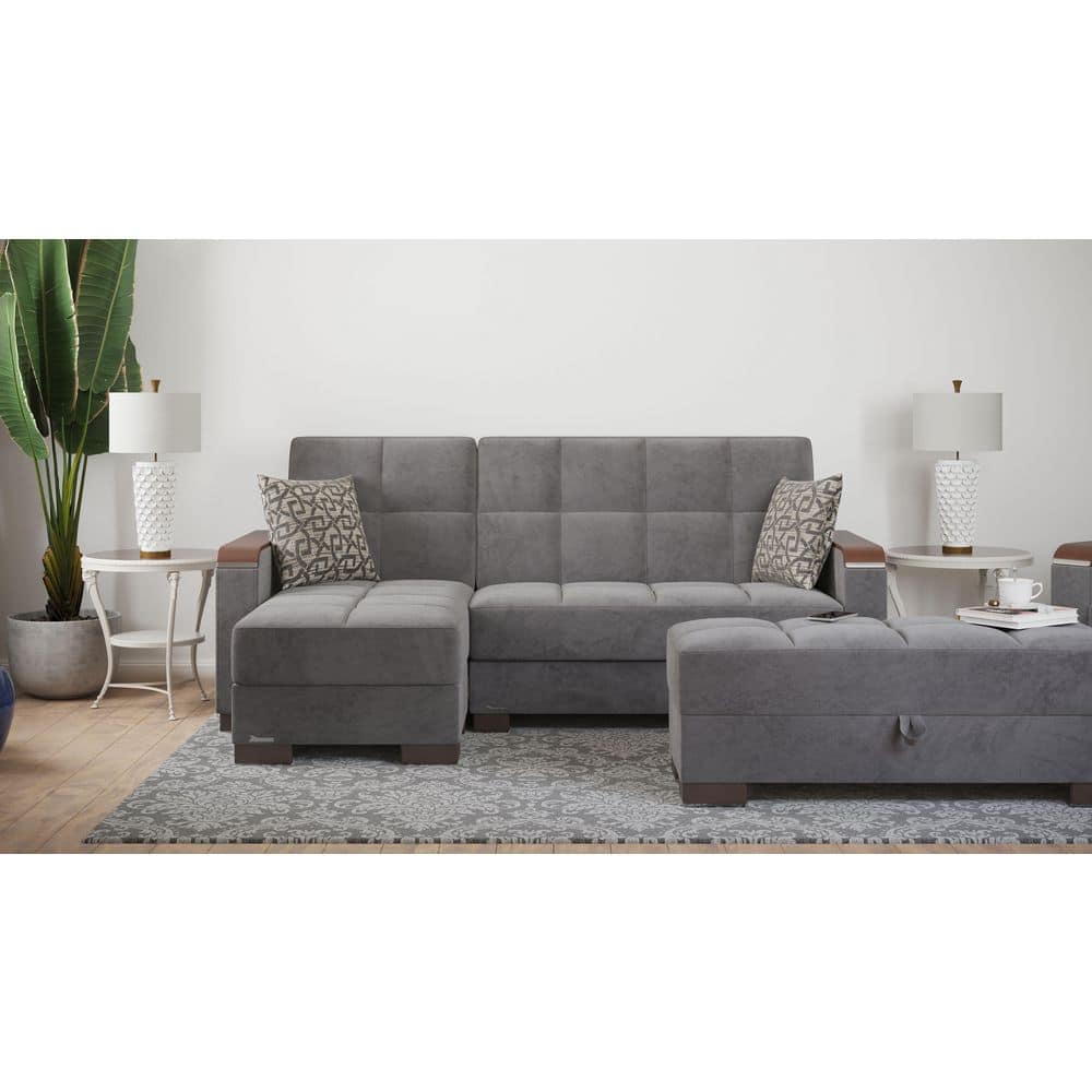 Gray microfiber sectional sofa and storage ottoman.