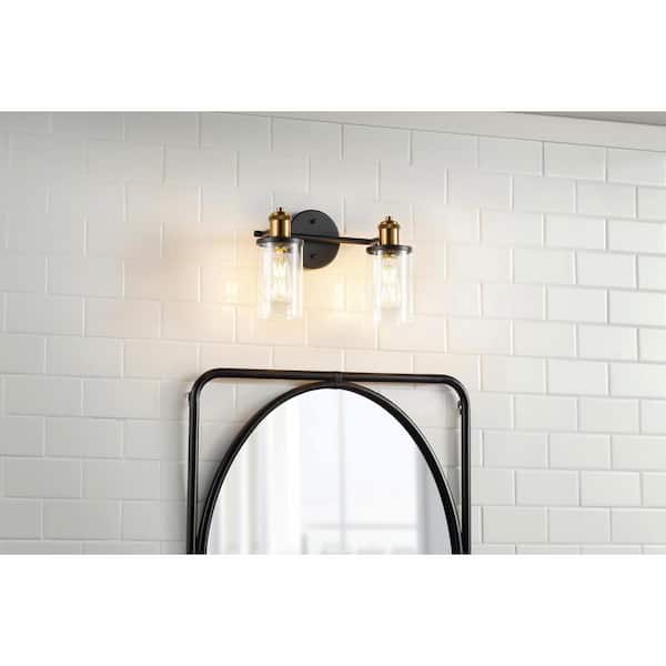 Tobias 2-Light Matte Black and Gold Vanity Light with Clear Glass Shades