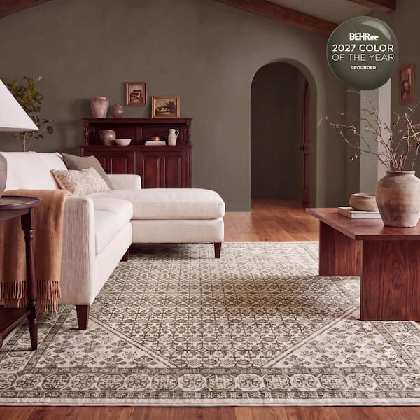 Arlena 6 ft. x 9 ft. Green Border Area Rug