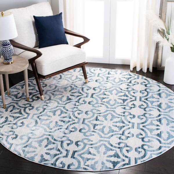 https://images.thdstatic.com/productImages/924301f5-dcaf-4b5b-bf25-7dcf634e0229/svn/navy-ivory-safavieh-area-rugs-msr0956n-7r-e1_600.jpg