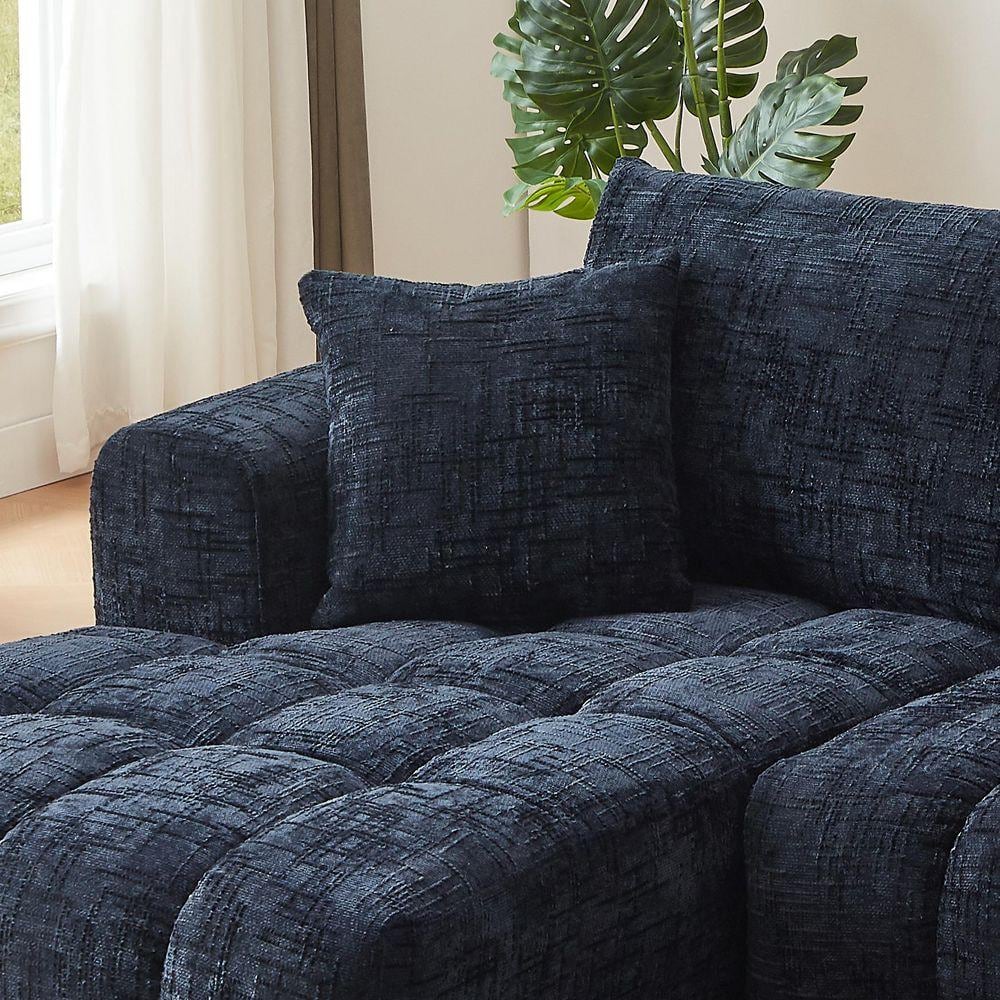 Dark blue L-shape sectional sofa displayed on a light-colored floor.