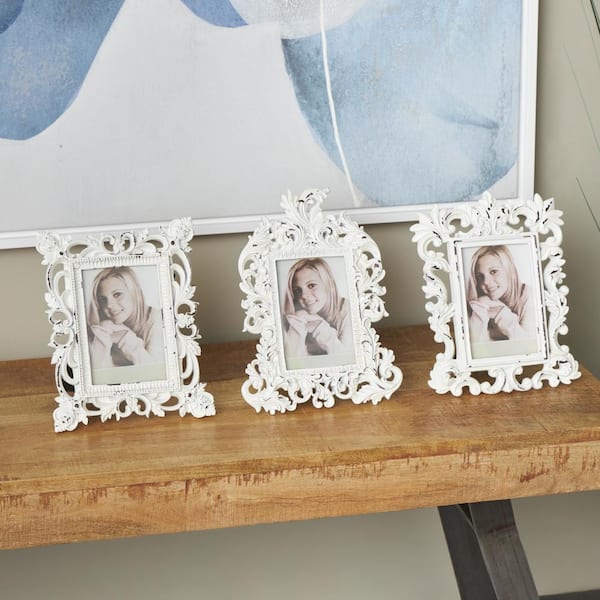 Litton Lane White Handmade Intricate Carved Scroll Polystone Photo Frame (3- Pack)
