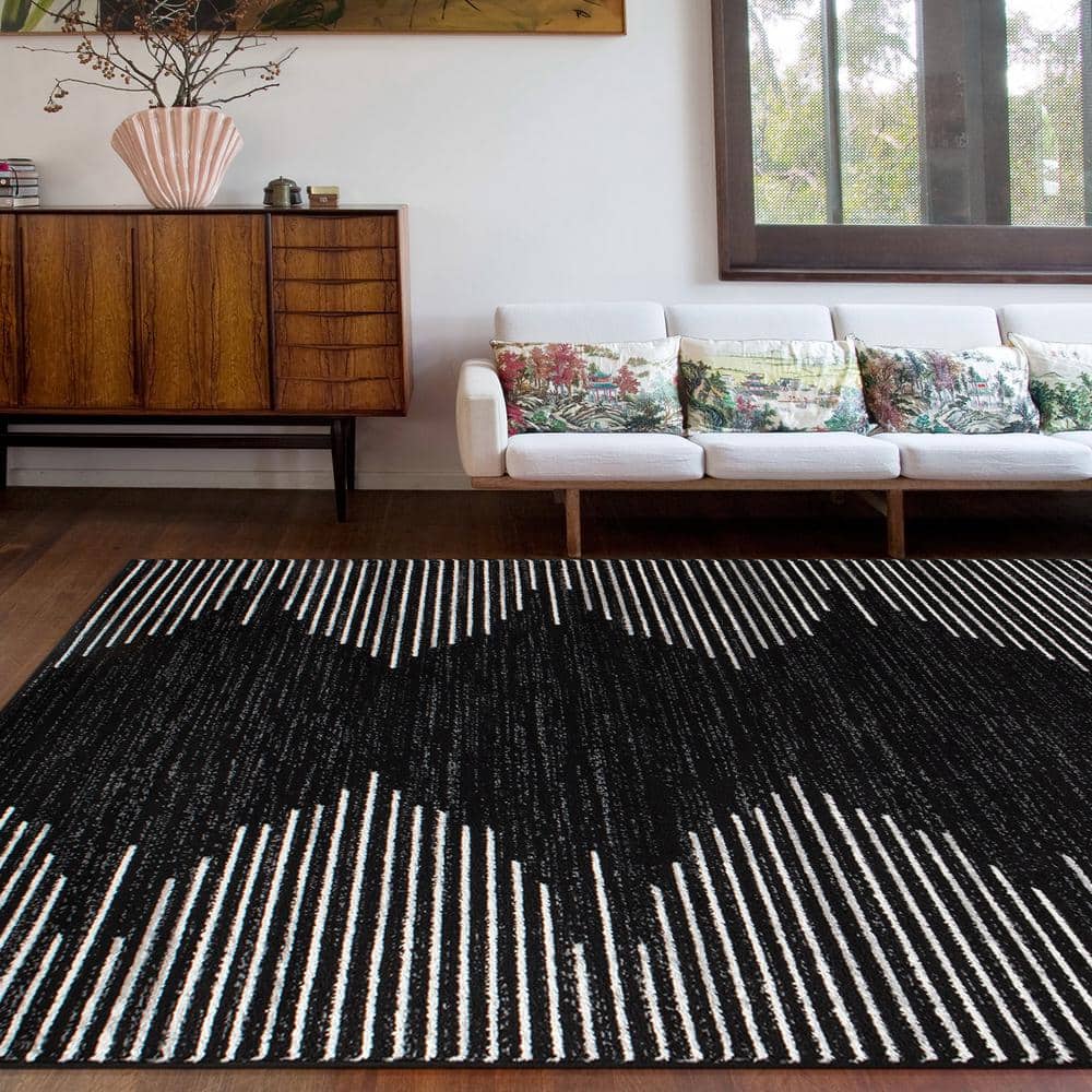 Black and White 5' x 7' Bohemian Stripe Synthetic Area Rug