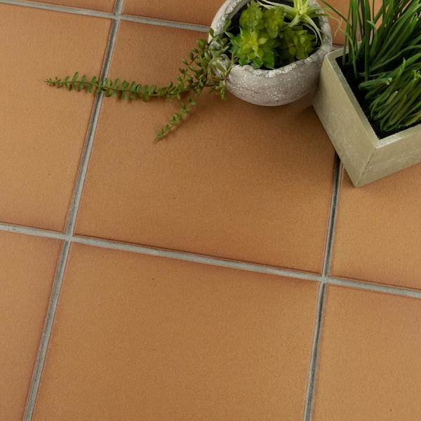 https://images.thdstatic.com/productImages/927999ea-8e54-4ad6-8368-587f1d55e542/svn/natural-low-sheen-merola-tile-ceramic-tile-fga10kn-4f_600.jpg