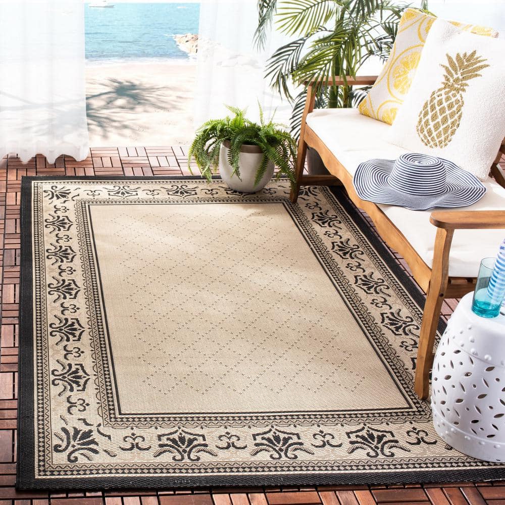 Black and Sand Floral Synthetic 9' x 12' Reversible Rug