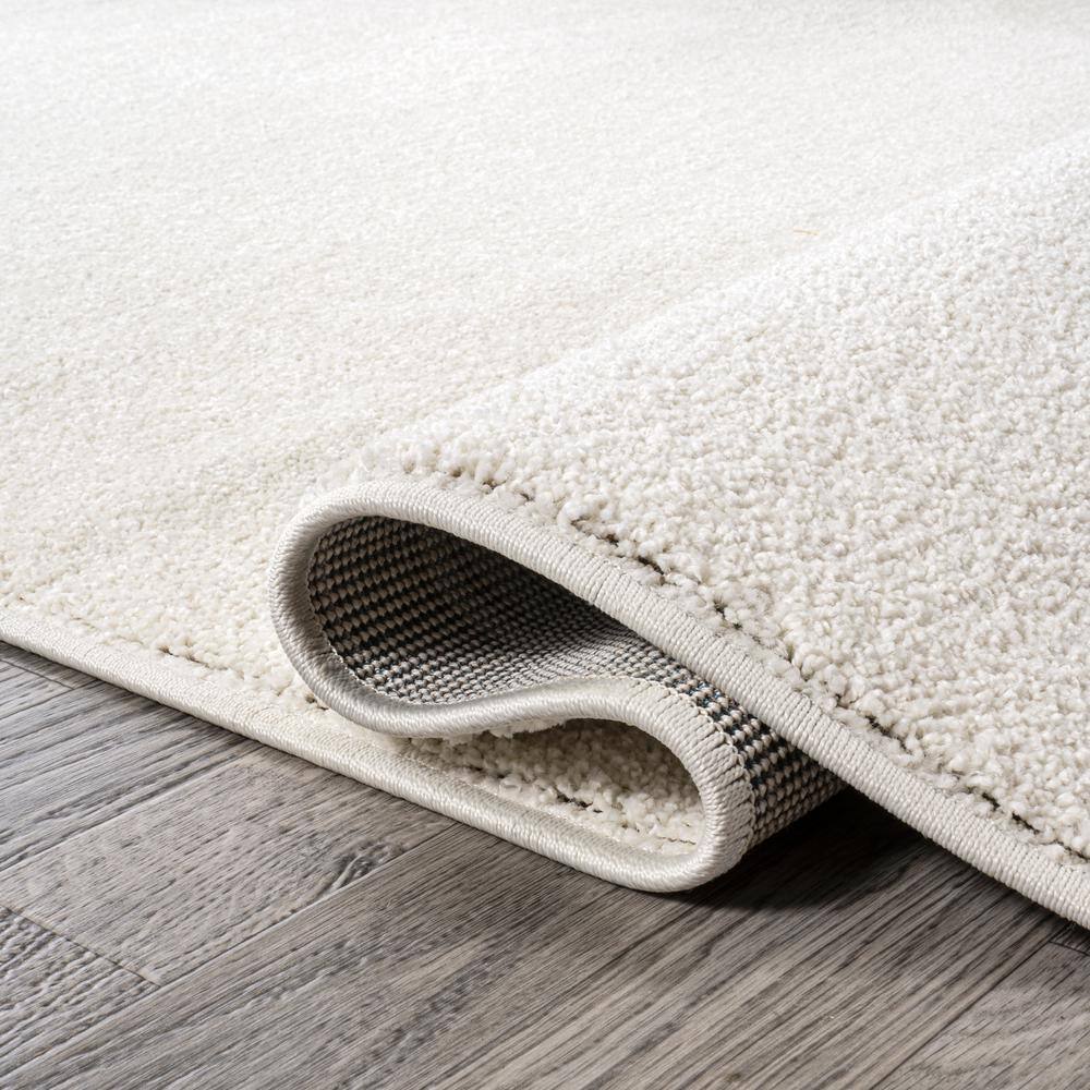 Cream Round Low-Pile Synthetic Area Rug, 4 ft.