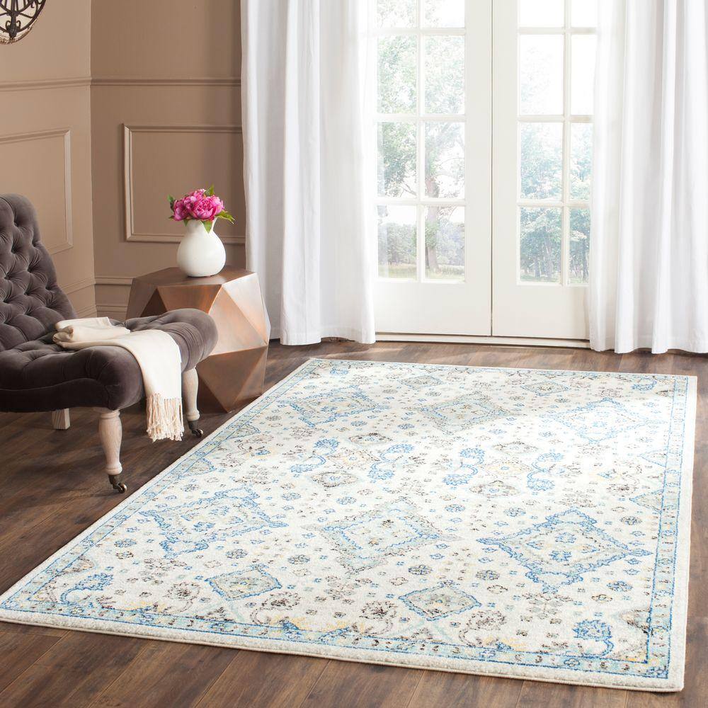 Ivory and Light Blue Floral High Pile Synthetic Rug