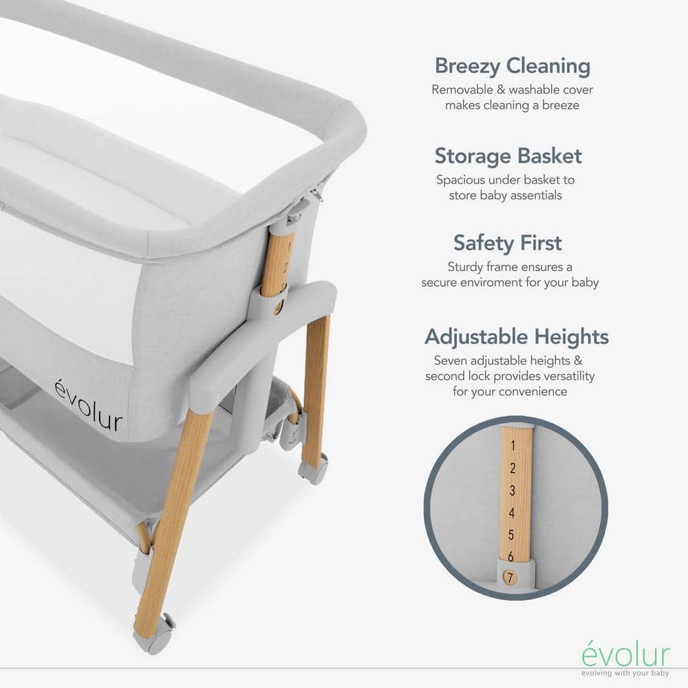 Light Gray Lullaby Portable Bassinet with wheels