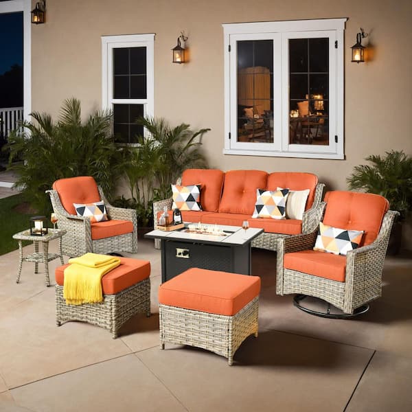 XIZZI Cristiano 7-Piece Wicker Patio Rectangular Fire Pit Set with Orange Red Cushions and Swivel Rocking Chairs