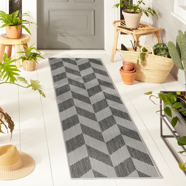 Patio Country Calla Black/Grey 2 ft. x 7 ft. Herringbone Indoor/Outdoor Area Rug