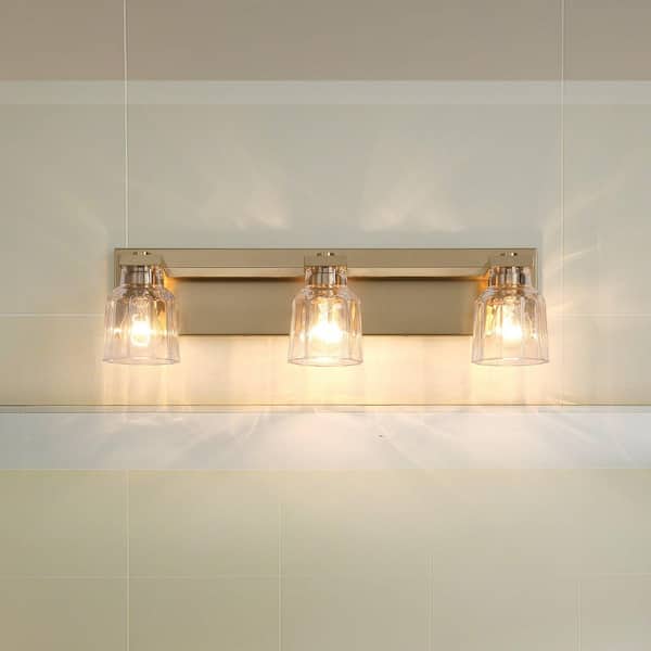 Dryden 24-in. 3-light Champagne Gold Vanity Light with Clear Ribbed Glass Shades