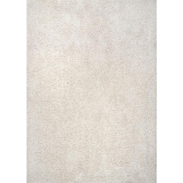 nuLOOM Clare Solid Shag Cream White 6 ft. 7 in. x 9 ft. Casual Area Rug