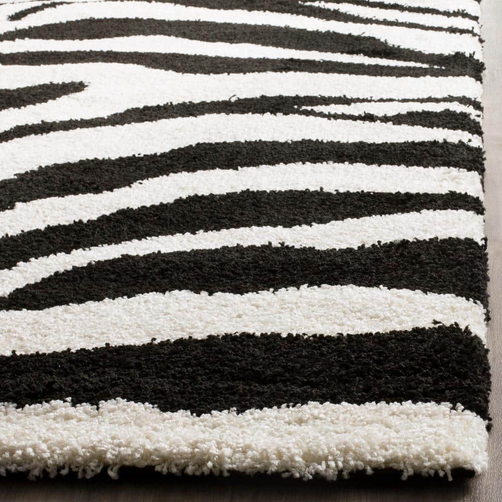 Ivory and Black Zebra Print Shag Area Rug 5'3" x 7'6"