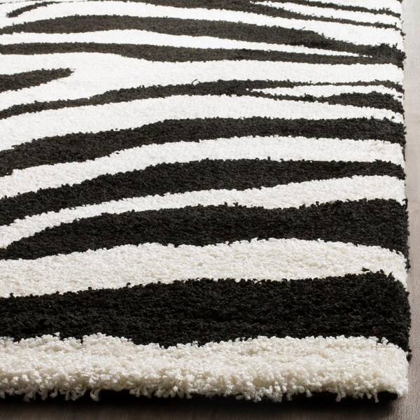 SAFAVIEH Florida Shag Ivory/Black 5 ft. x 8 ft. Animal Print Area